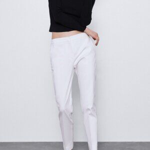 White Zara pants. Black stretch waist band.
